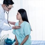 Asian,Male,Doctor,Using,A,Stethoscope,Lisen,To,Heart,Rate