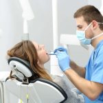 Dentist working with a patient